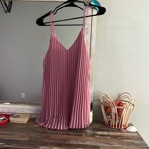 Women’s pink tank top by the target brand “a new day”.